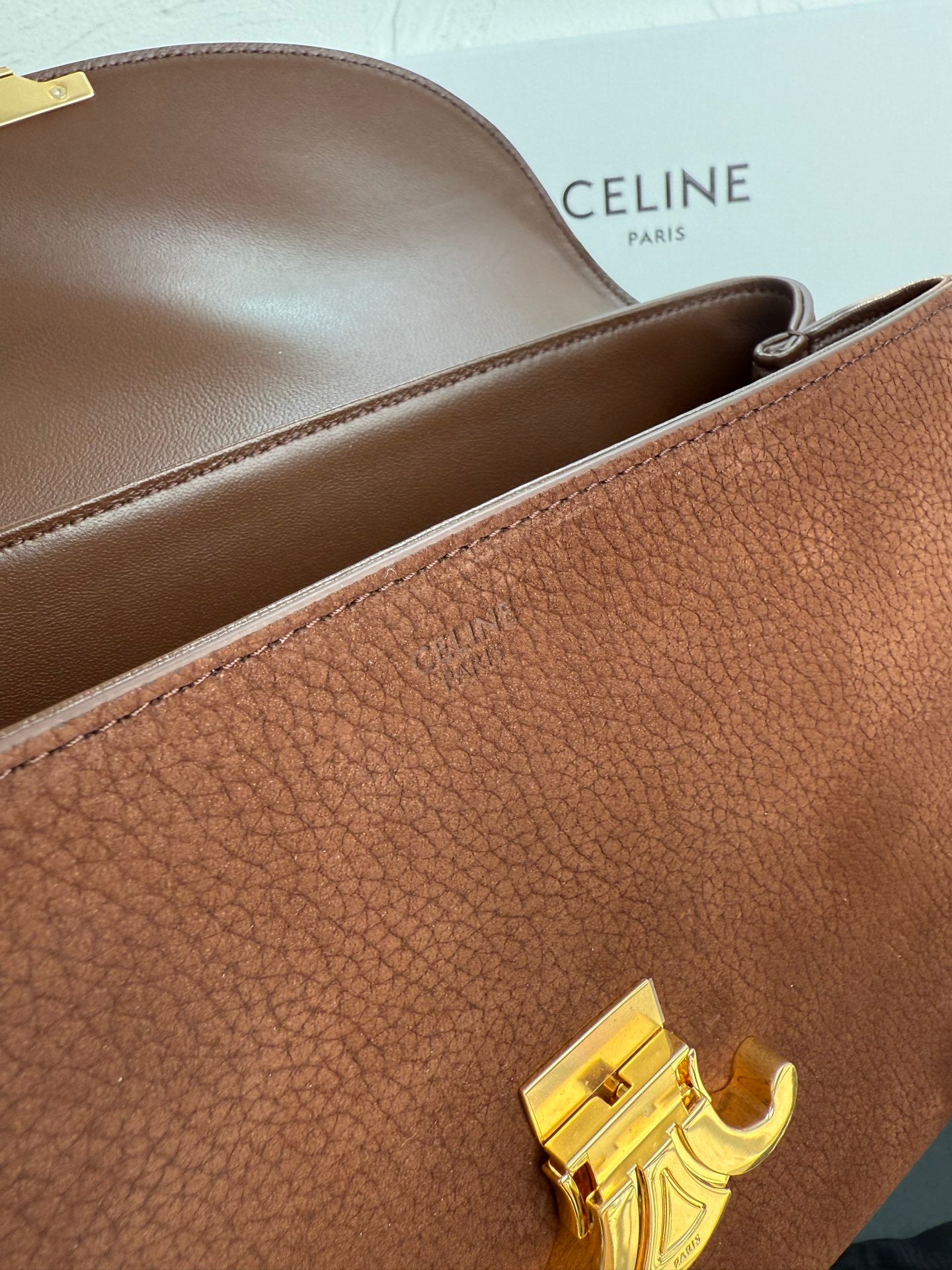 Celine brown leather bag with rolled top opening and gold-tone clasp hardware