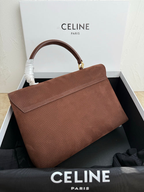 Celine brown leather handbag with top handle, front flap, and gold clasp