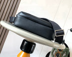 Men's dark leather crossbody bag with wide strap and front flap