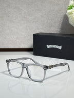 Chrome glasses with translucent gray frames and clear lenses, ornate temple hardware
