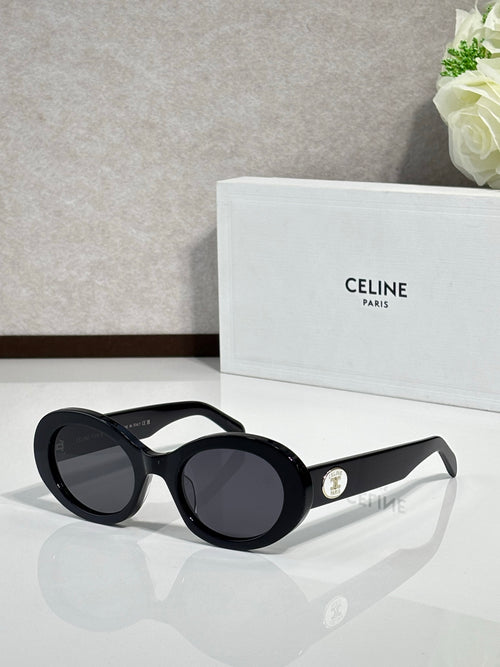 Celine sunglasses with round black frames and dark tinted lenses