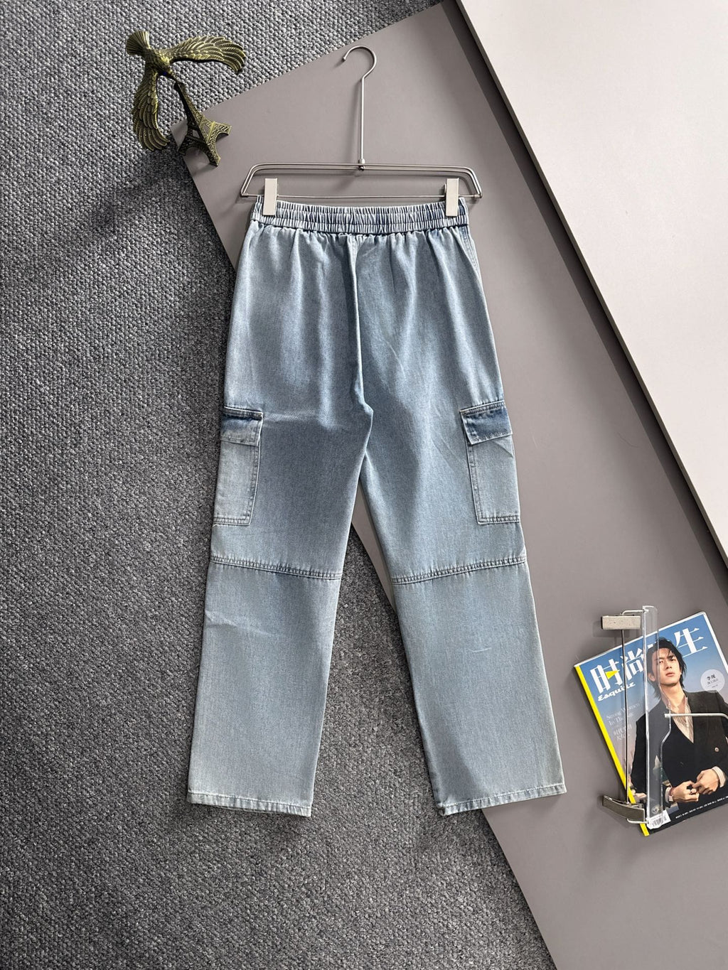 Louis Vuitton light blue denim cargo pants on hanger, elastic waist with drawstring