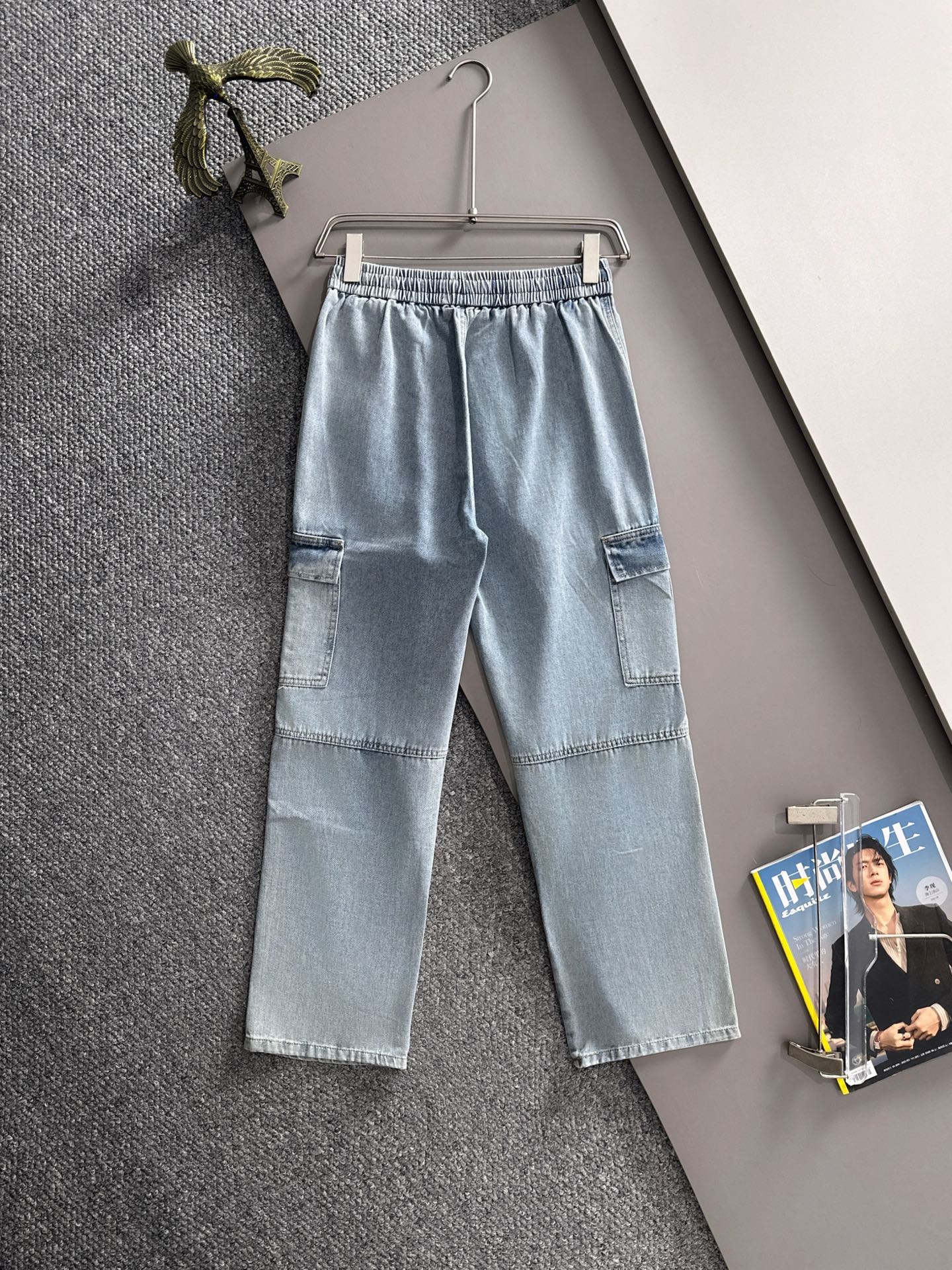 Louis Vuitton light blue denim cargo pants on hanger, elastic waist with drawstring