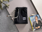 Dior dark denim pants, elastic waist with drawstrings, front patch logo