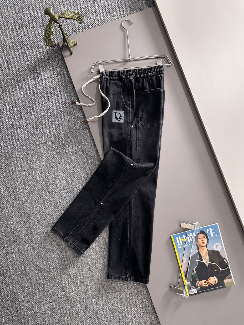 Dior dark denim pants with cuffed hems, drawstring waist and straight leg