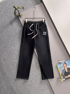 Dior dark denim pants with drawstring elastic waistband and straight legs
