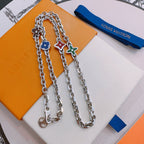 Silver charm necklace set with dangling multi-charm pendants
