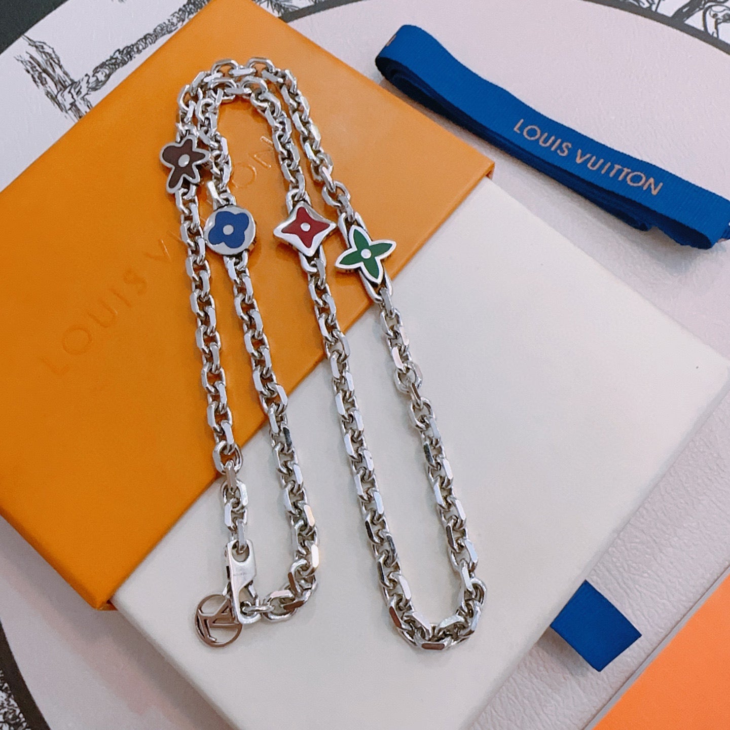 Silver charm necklace set with dangling multi-charm pendants