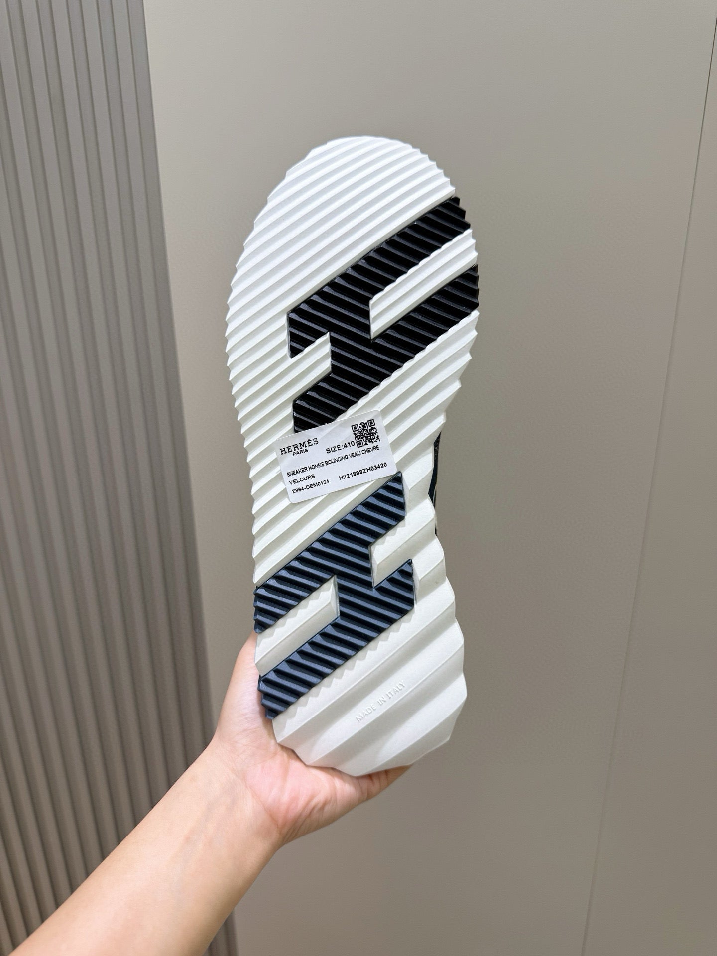 Shoe outsole with black-and-white tread pattern
