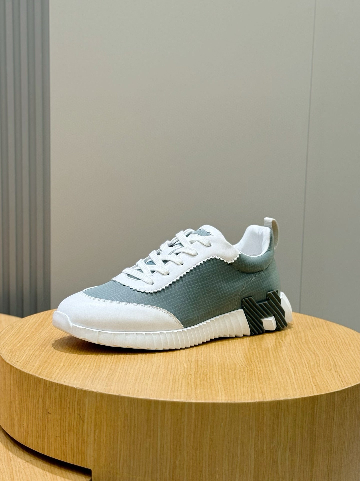 Hermes unisex lace-up sneakers, white sole and gray-green mesh upper