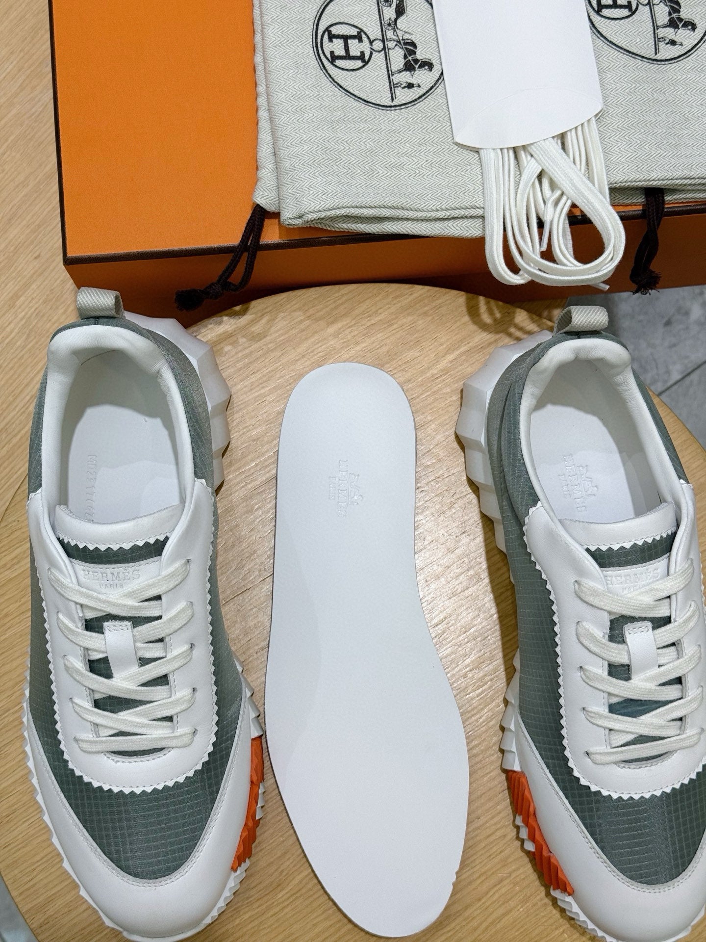 Hermes unisex lace-up sneakers with extra laces and white insoles