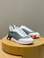 Hermes unisex lace-up sneakers, white/gray-green mesh with orange side pull tab