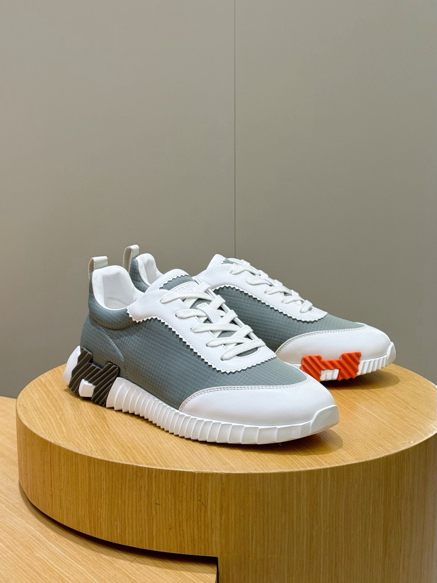 Hermes unisex lace-up sneakers, white/gray-green mesh with orange side pull tab
