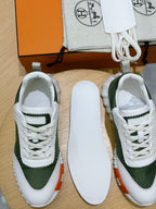 Hermes unisex sneakers pair, white and dark green uppers with lace-up front
