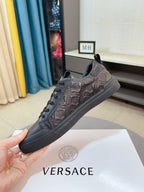 Low-top sneakers in dark gray, textured upper with logo, lace-up