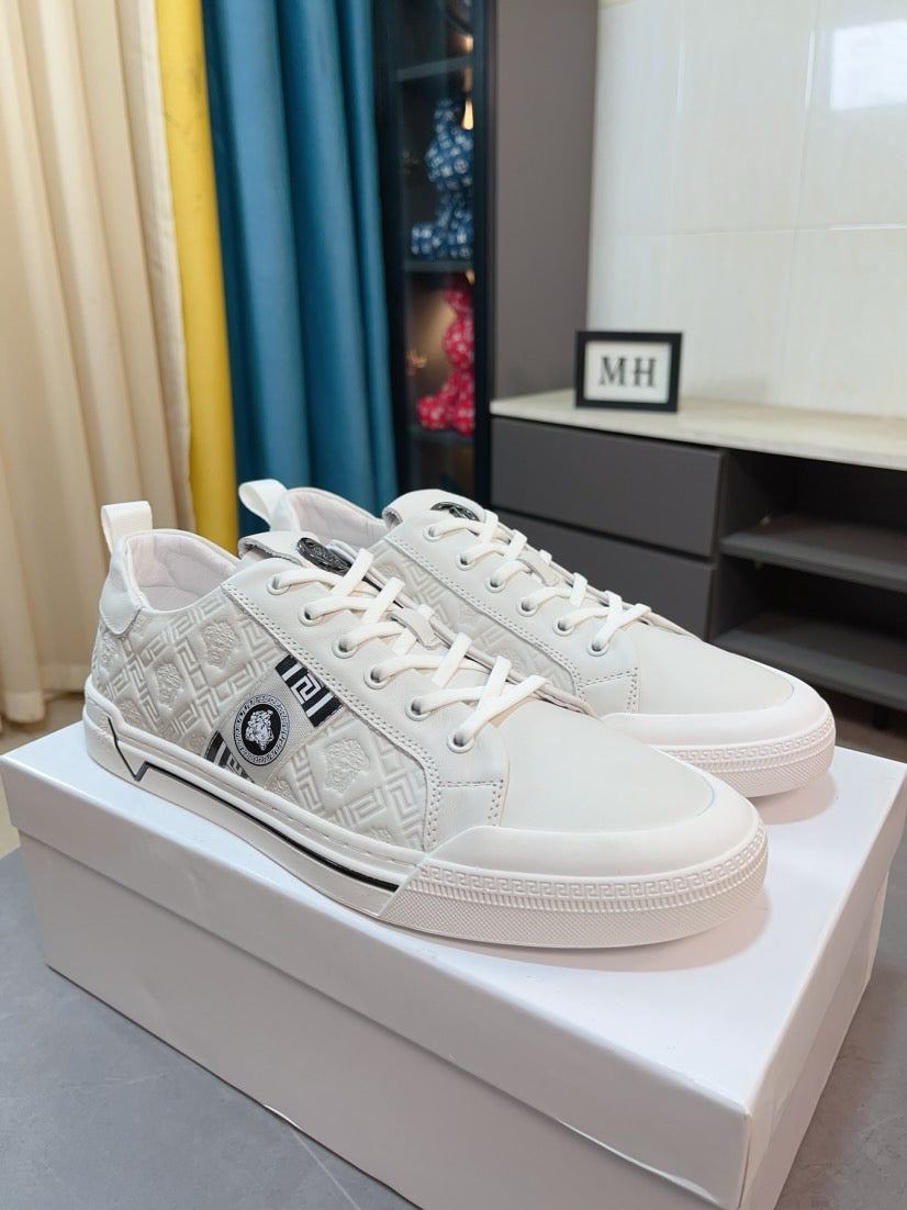 Versace low-top sneakers in white, lace-up with logo patch and gripped sole