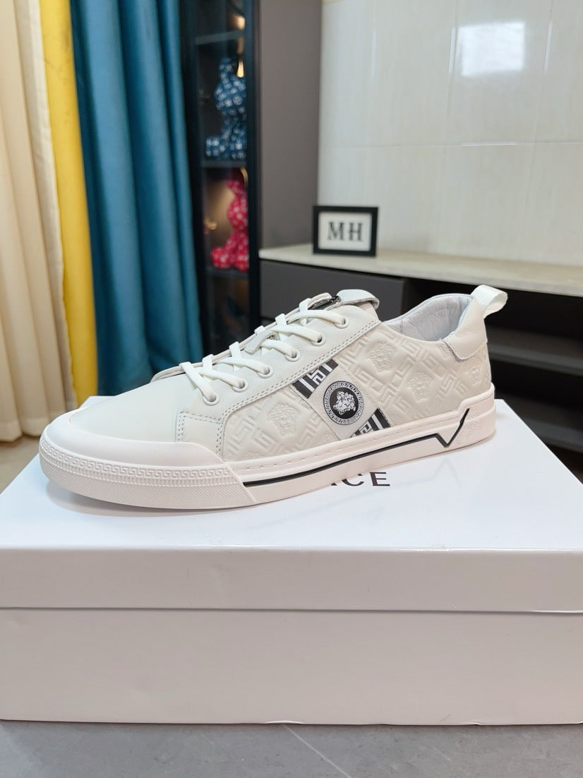 Versace low-top sneakers in white, lace-up with patterned upper and round logo