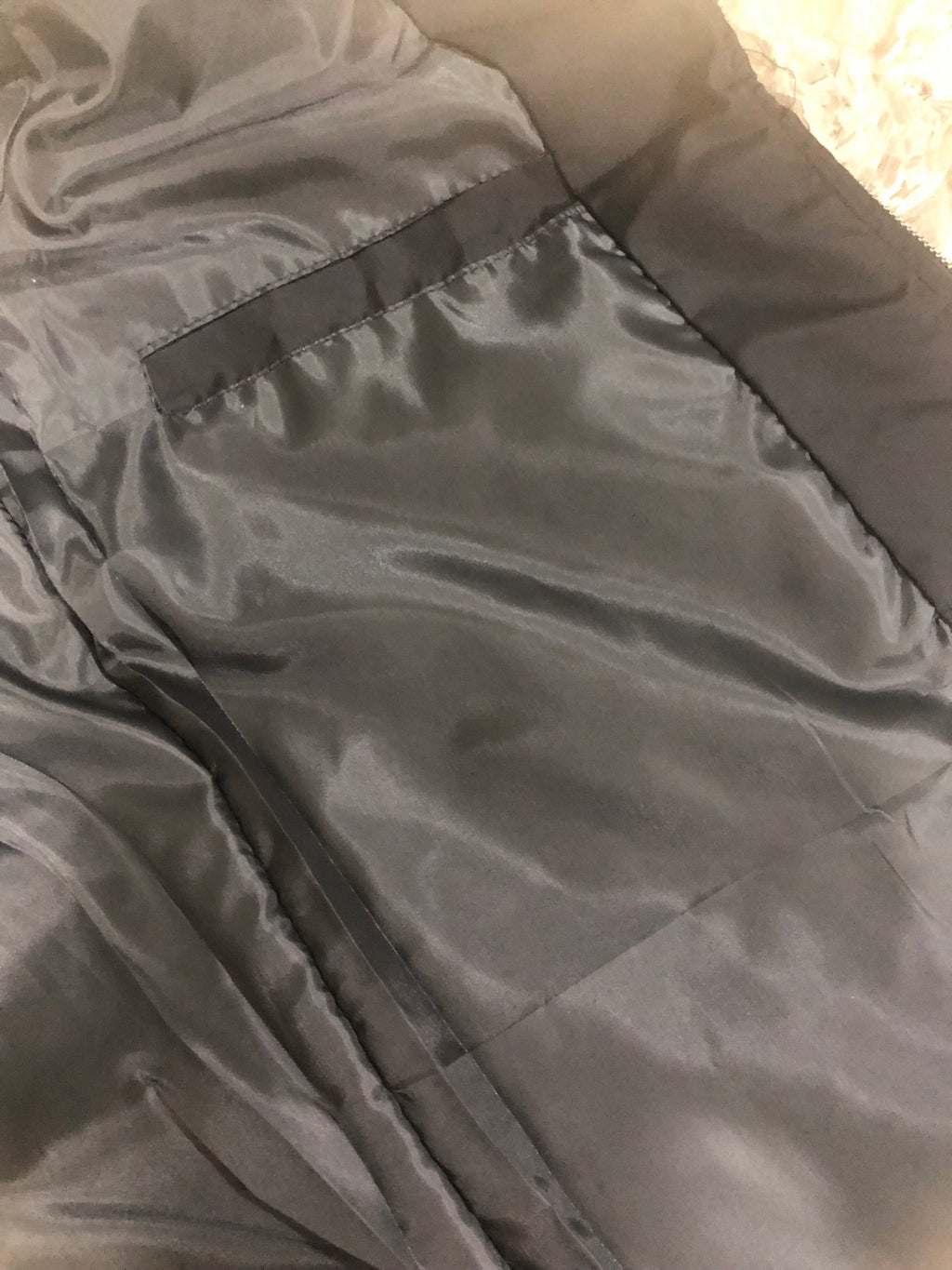 Moncler black long jacket interior lining with seam details