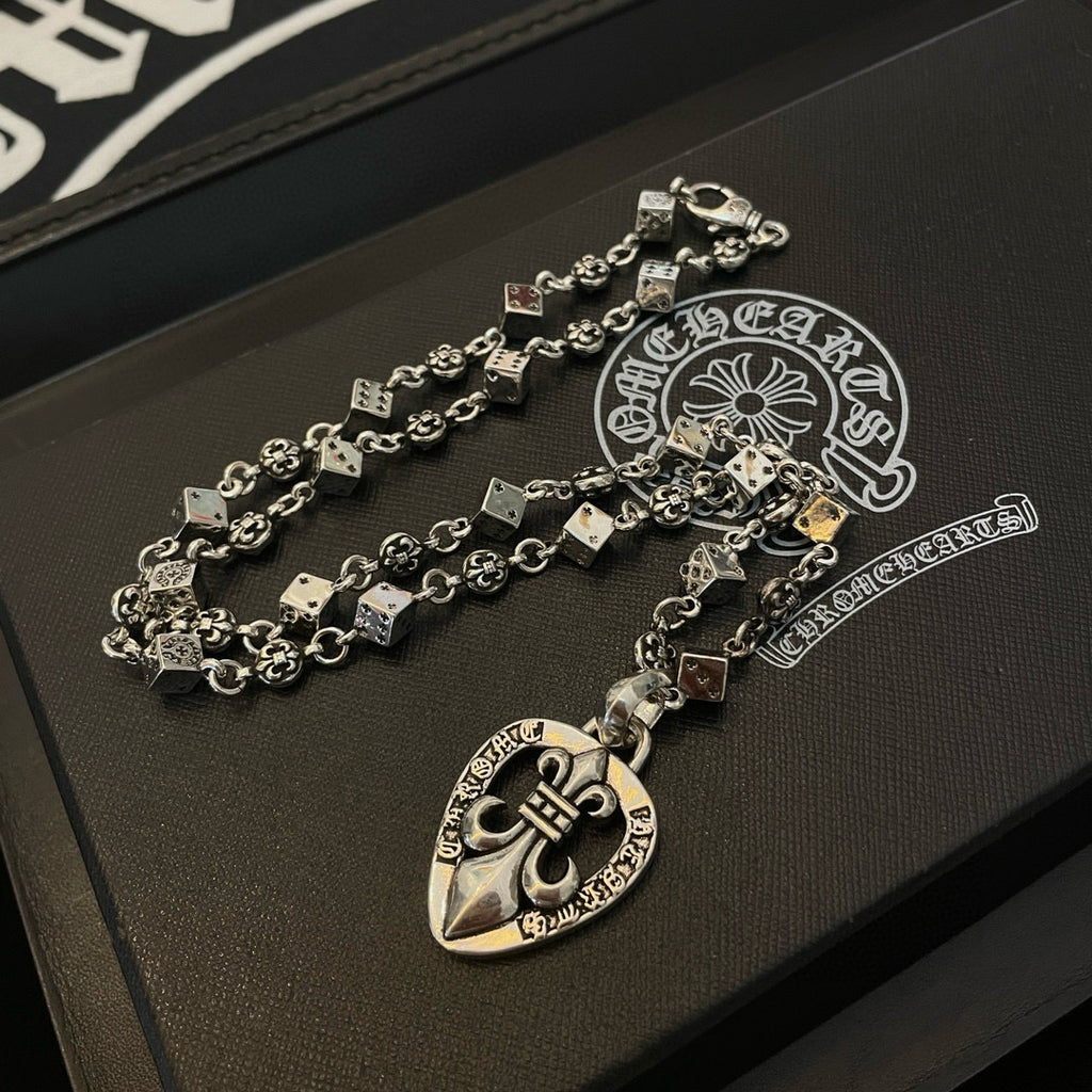Silver-tone charm necklace with heart pendant charm and rectangular link chain