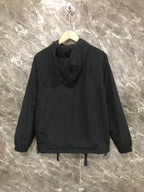 Black hooded long jacket with zip front and relaxed gathered hem