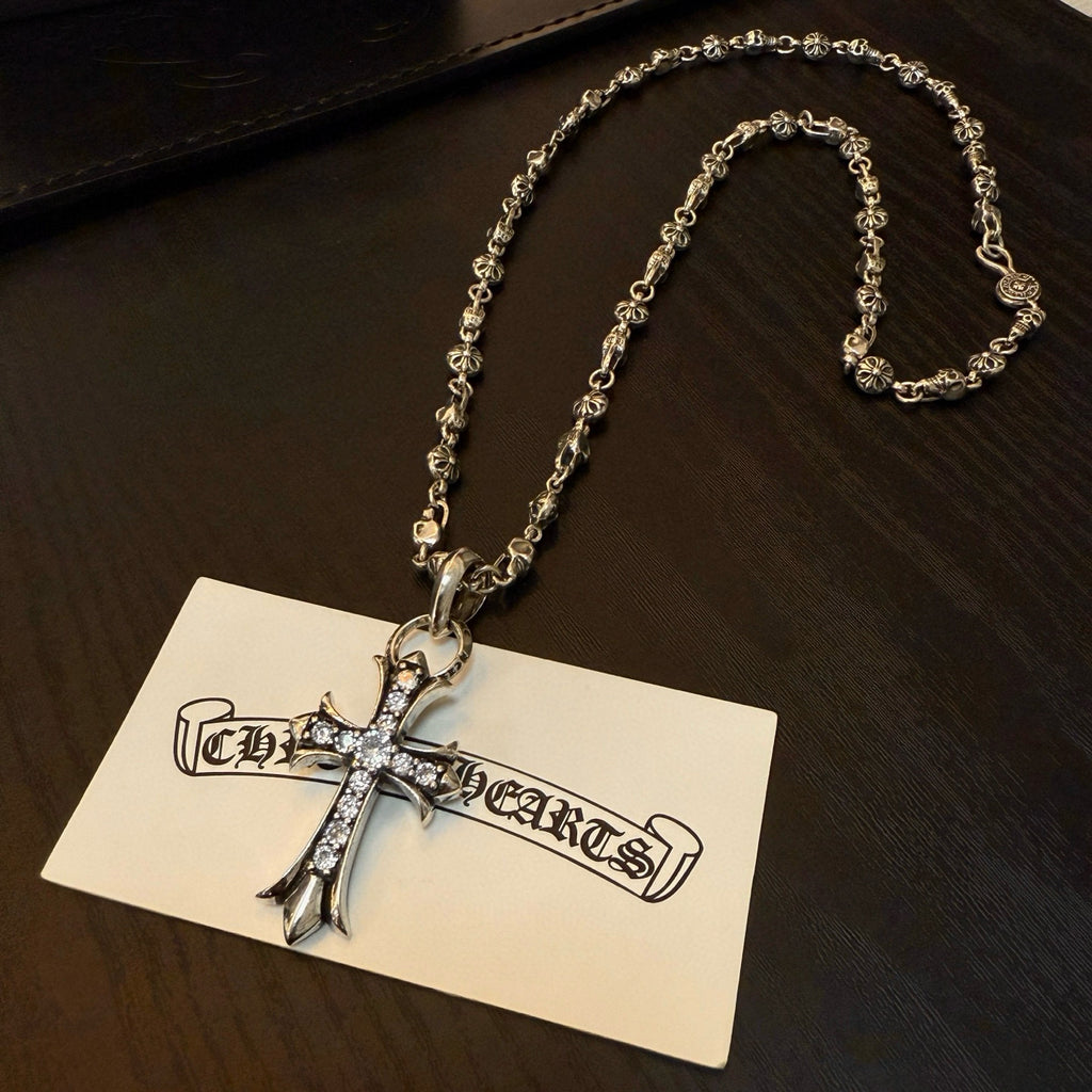 Chrome accessories cross pendant necklace on a card, silver-tone cross pendant and chain