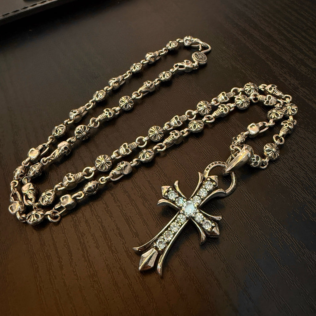Chrome accessories two necklace chains with cross pendant, silver-tone links and flower details