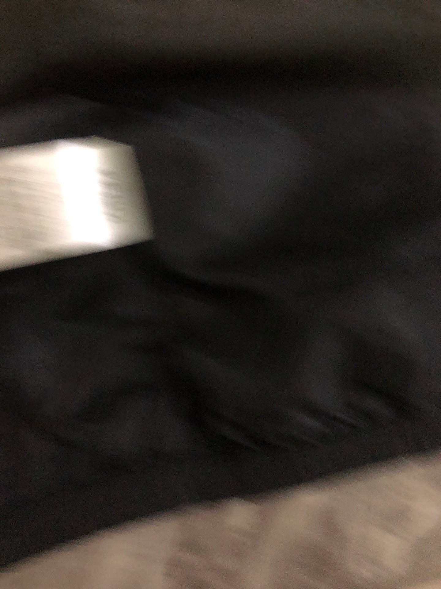 Windbreaker jacket lining, dark fabric with smooth interior