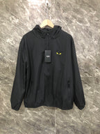 Fendi hooded windbreaker jacket, dark fabric, front zipper and logo patch