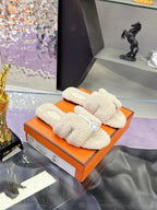 Hermes ladies shearling slides on orange box, cream fuzzy slides with logo patch