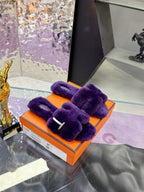Hermes ladies purple faux-fur bow slides on orange box, side view