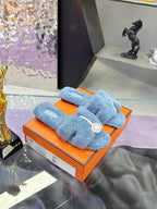 Hermes plush slip-on sandals, light blue fuzzy mules with white strap and round emblem