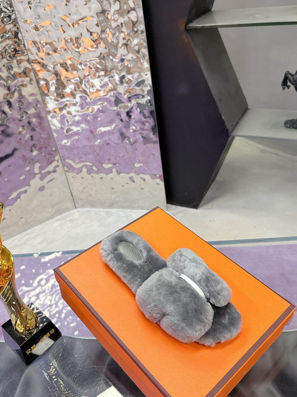 Hermes luxury shoes, grey fur slide with single strap on orange box