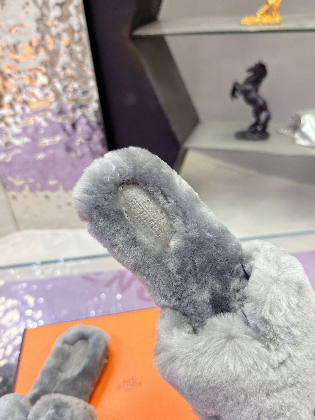 Hermes luxury shoes, grey plush slide with insole label view