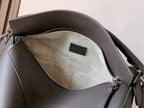 Loewe men's bag interior view with fabric lining and zip pocket