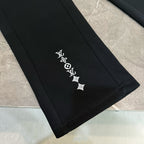 Louis Vuitton black pants hem detail with white logo symbols