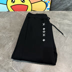 Louis Vuitton black pants with drawstring waist and vertical logo symbols