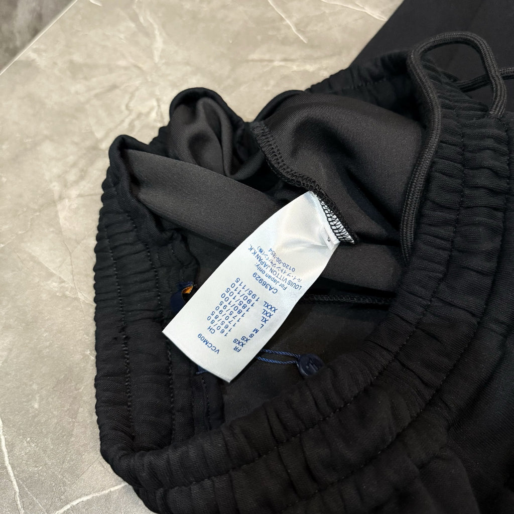 Louis Vuitton black pants with tag and elastic gathered waistband