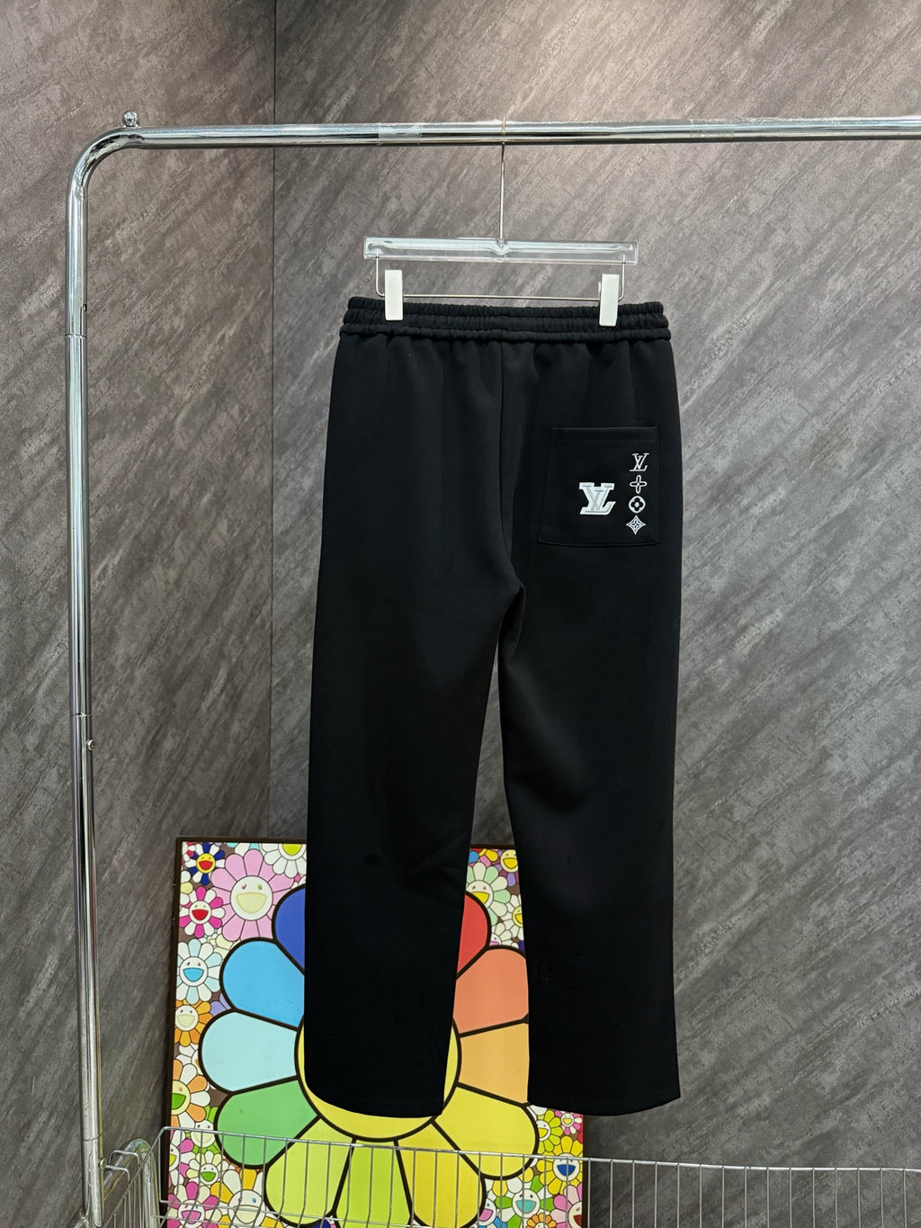 Louis Vuitton black pants with side logo patch on right thigh