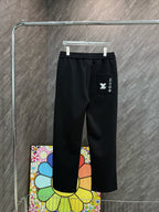 Louis Vuitton black pants with side logo patch on right thigh