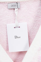 Dior pink textured cardigan with white neck trim and hanging tag