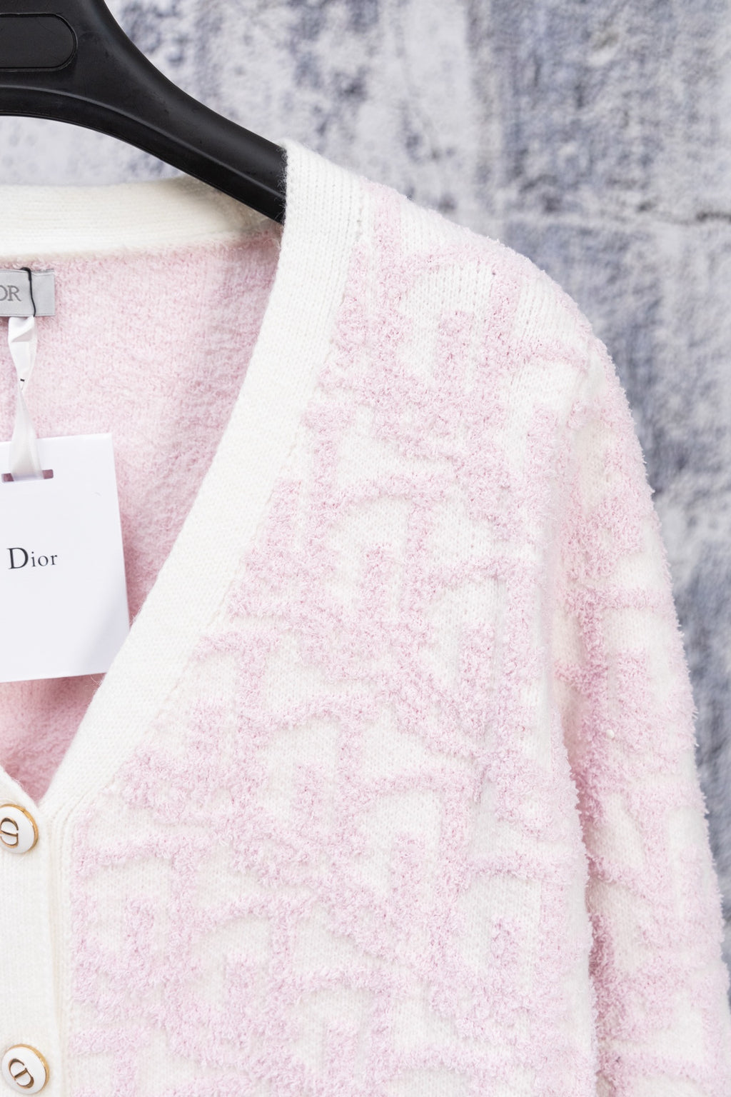 Dior pale pink V-neck cardigan with white trim and front button placket