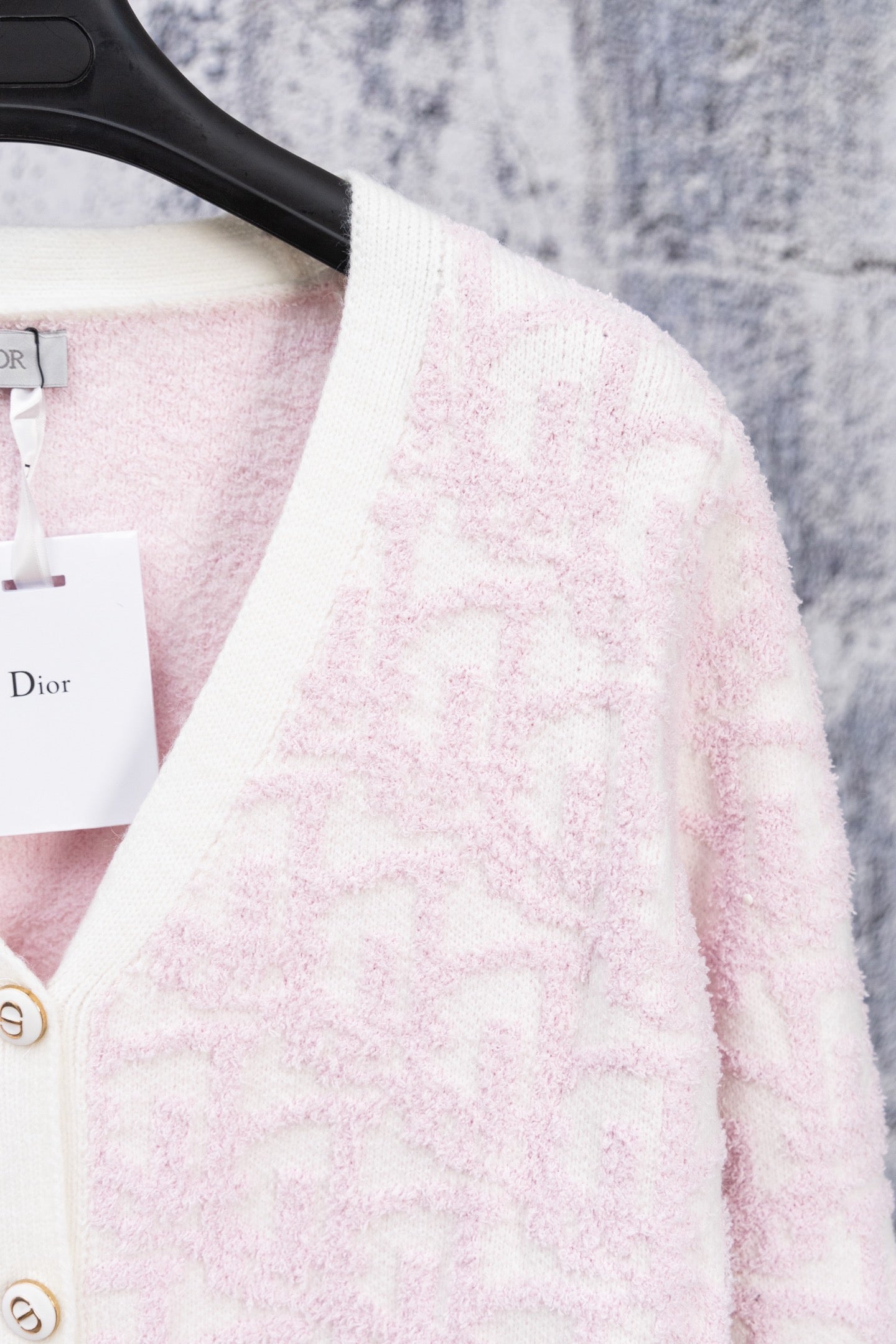 Dior pale pink V-neck cardigan with white trim and front button placket