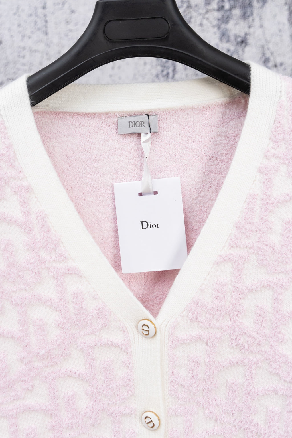 Dior pale pink V-neck cardigan with front buttons and hanging tag