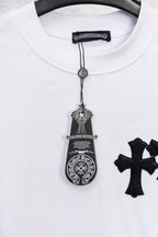 White crewneck T-shirt with decorative pendant graphic and partial cross print