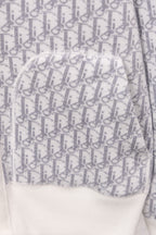 Dior monogram zip hoodie fabric detail, repeating pattern with white trim