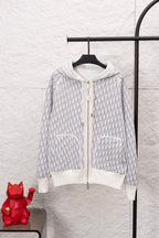 Dior monogram zip hoodie front, white hood and sleeves with patterned knit