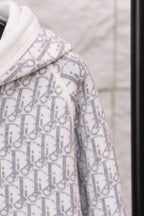 Dior hoodie with white hood and blue logo-print cuff detail