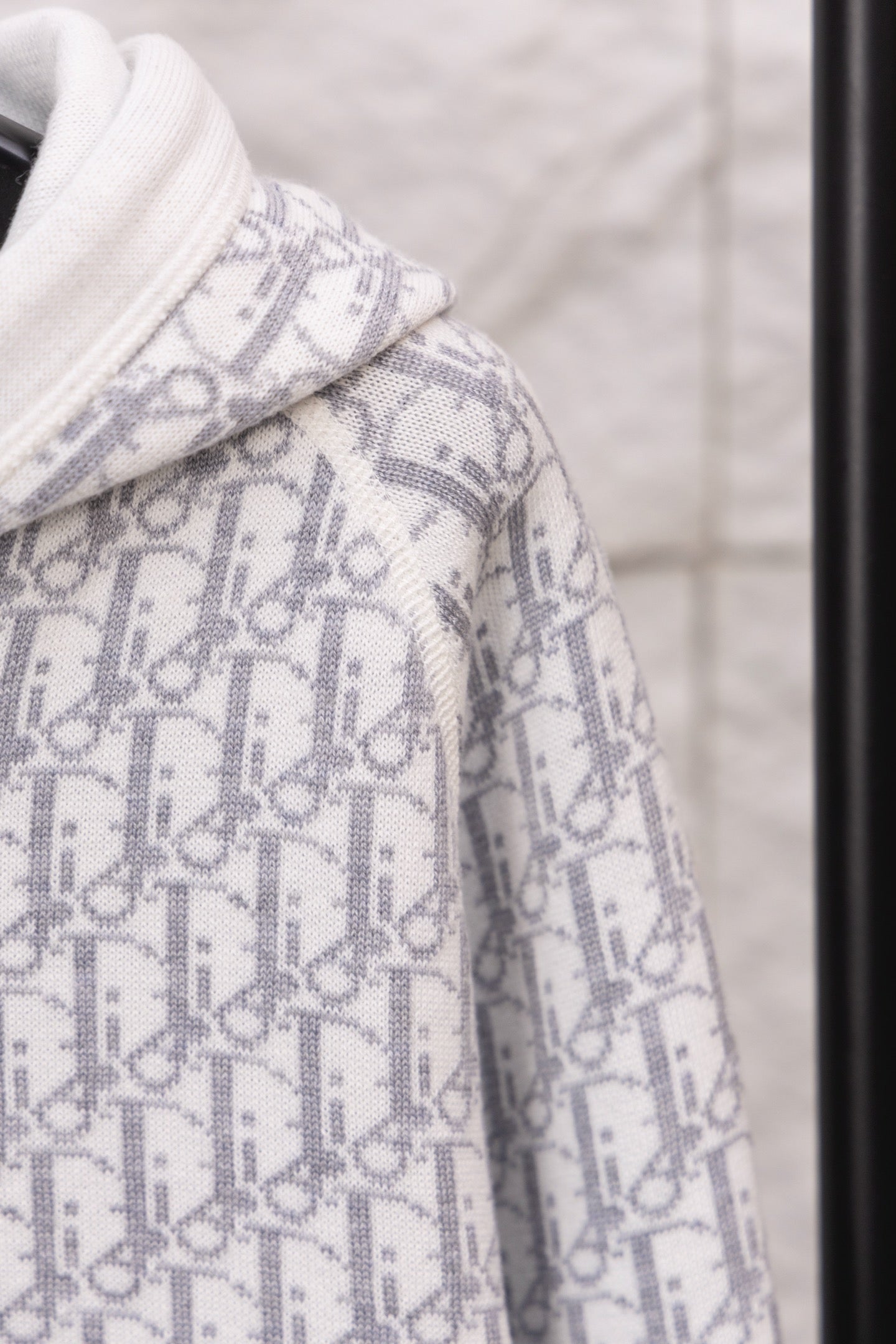 Dior hoodie with white hood and blue logo-print cuff detail