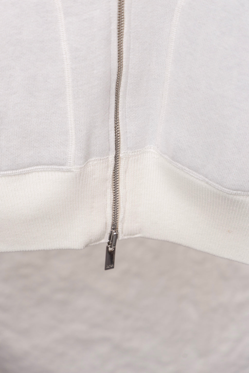 Dior hoodie front zipper with metal slider on white knit
