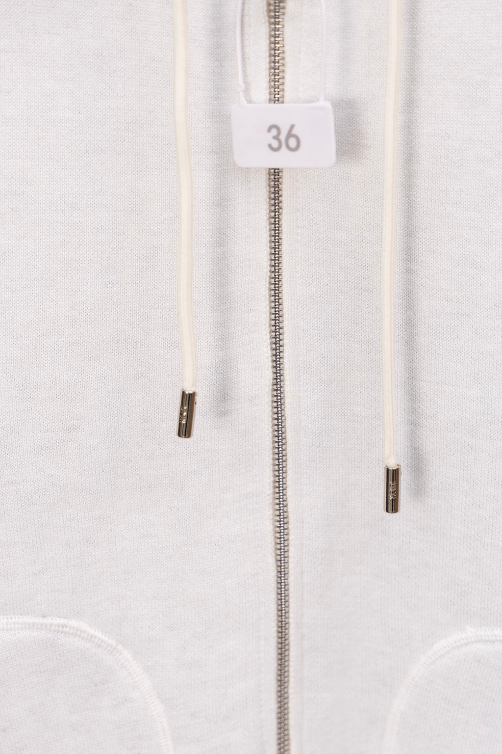 Dior hoodie front zipper with size 36 tag and metal pull tabs